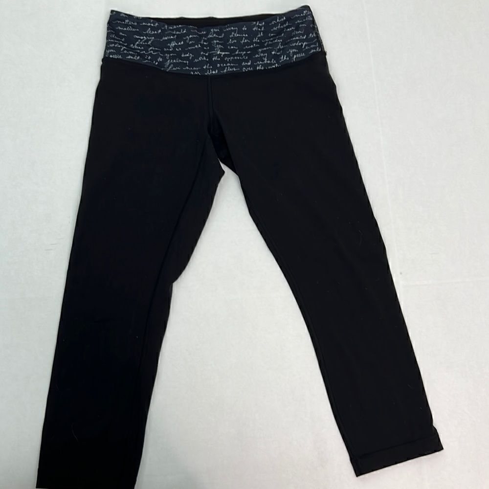 Lululemon wunder under black leggings with script waistband size 6